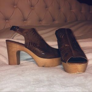Leather and wood clogs